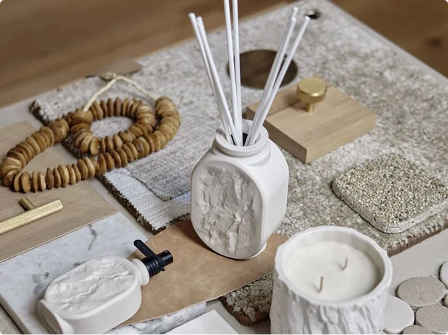 A Sir Jacobs diffuser and accessories styled on a stone tray